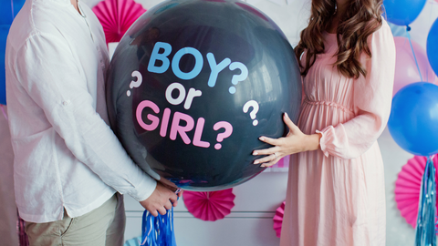 Gender reveal ballon prikken